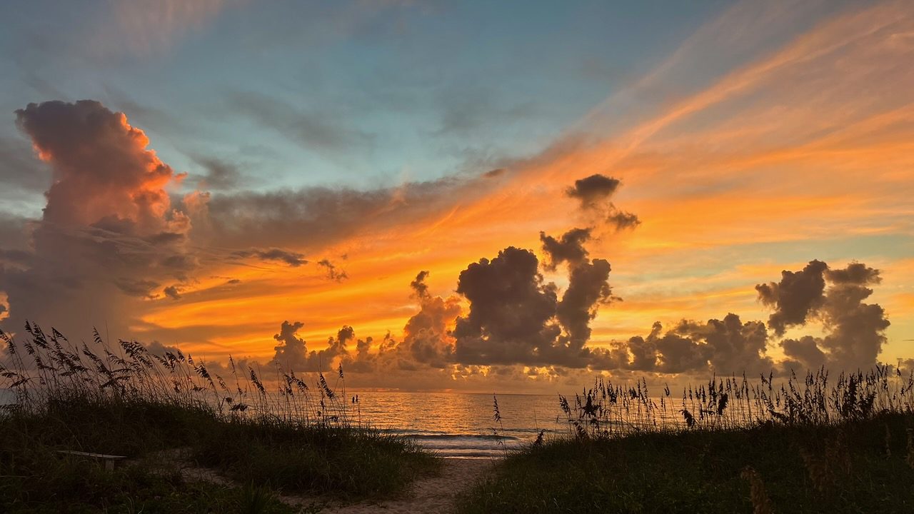 Sunset over the sea oats and dunes on Hutchinson Island, Fort Pierce